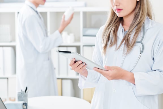female doctor with tablet computer